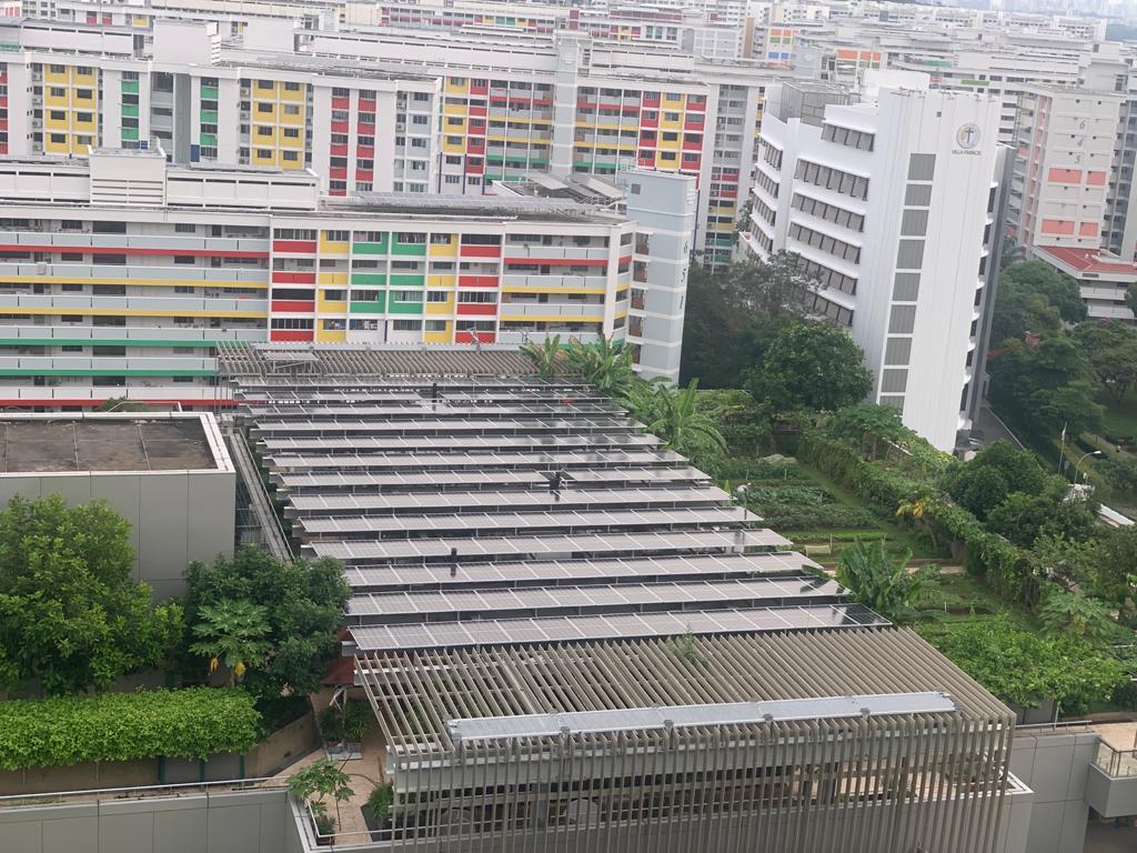 Solar panels at Khoo Teck Puat Hospital above the air conditioner units